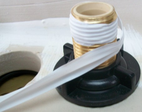 PTFE Teflon Tape Wound Around Threaded Pipe Fitting